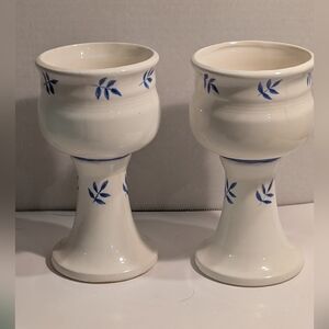 An art studio pottery wine goblet/chalice with French faience style blue leaves.
